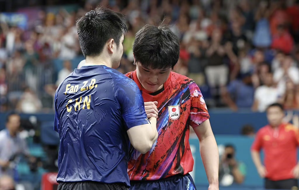 开云体育入口-法国队鏖战德国队，张本智和惊艳四座